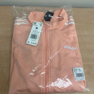 Women’s adidas track top. New. Medium